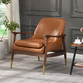 Fauteuil de salon en similicuir de style médiéval avec assise rembourrée, cadre en bois massif et pieds en laiton.